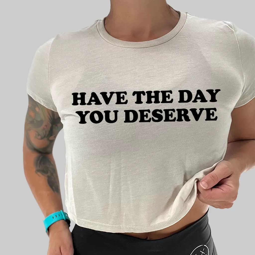 Ladies "Have The Day You Deserve" Flowy Crop Tee