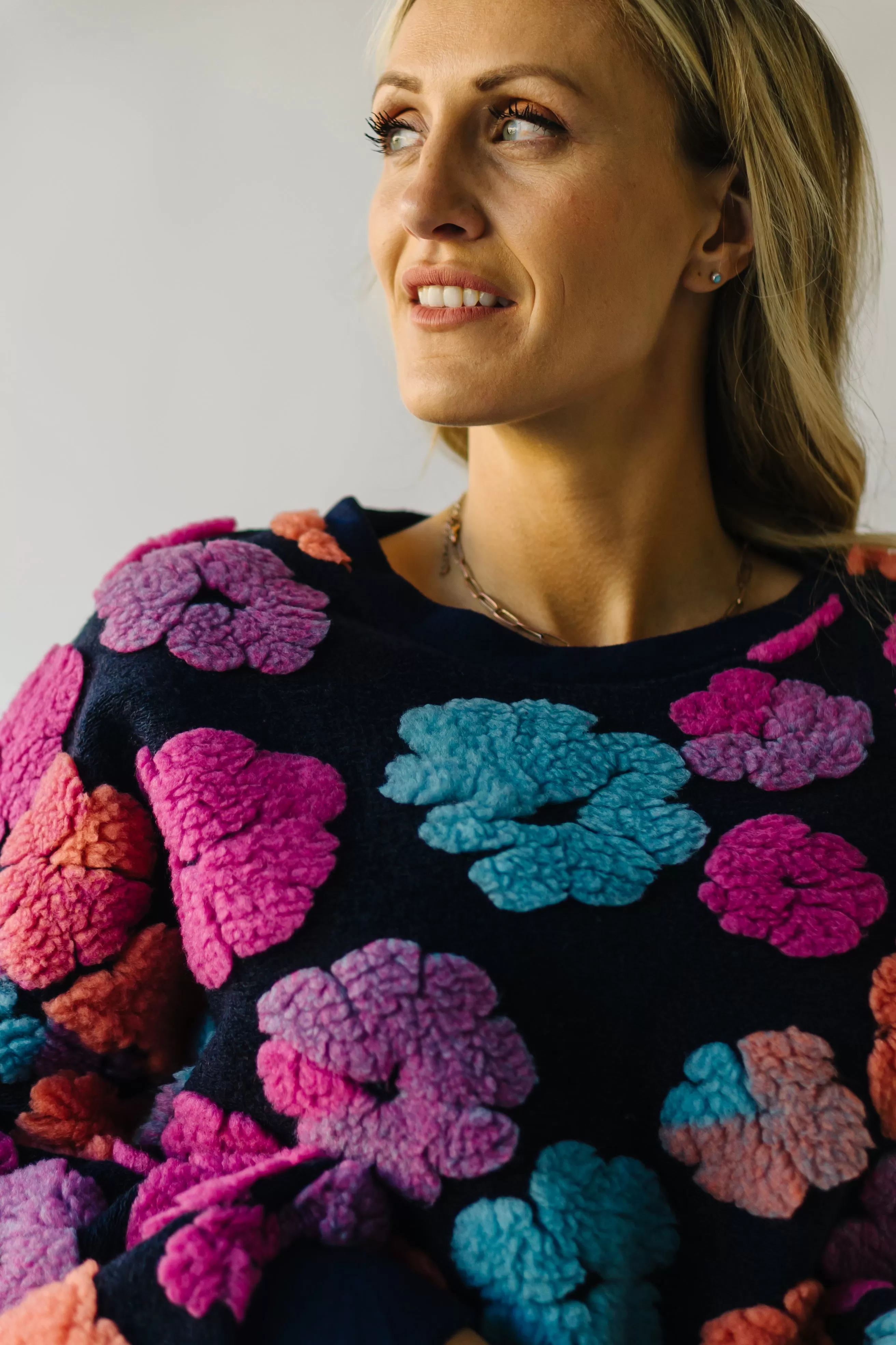 The Flanagan Sherpa Flower Detail Sweater in Navy   Fuchsia