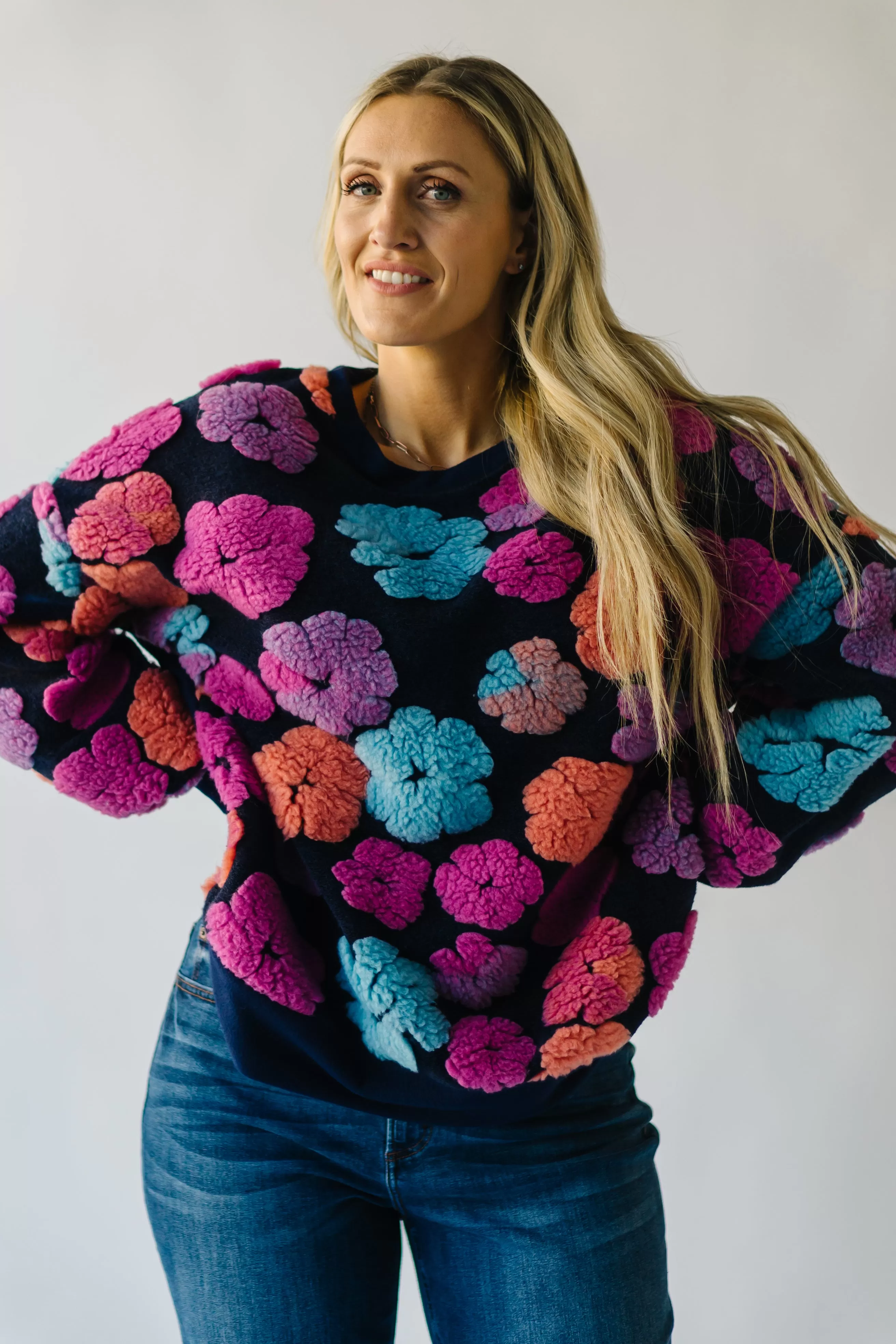 The Flanagan Sherpa Flower Detail Sweater in Navy   Fuchsia