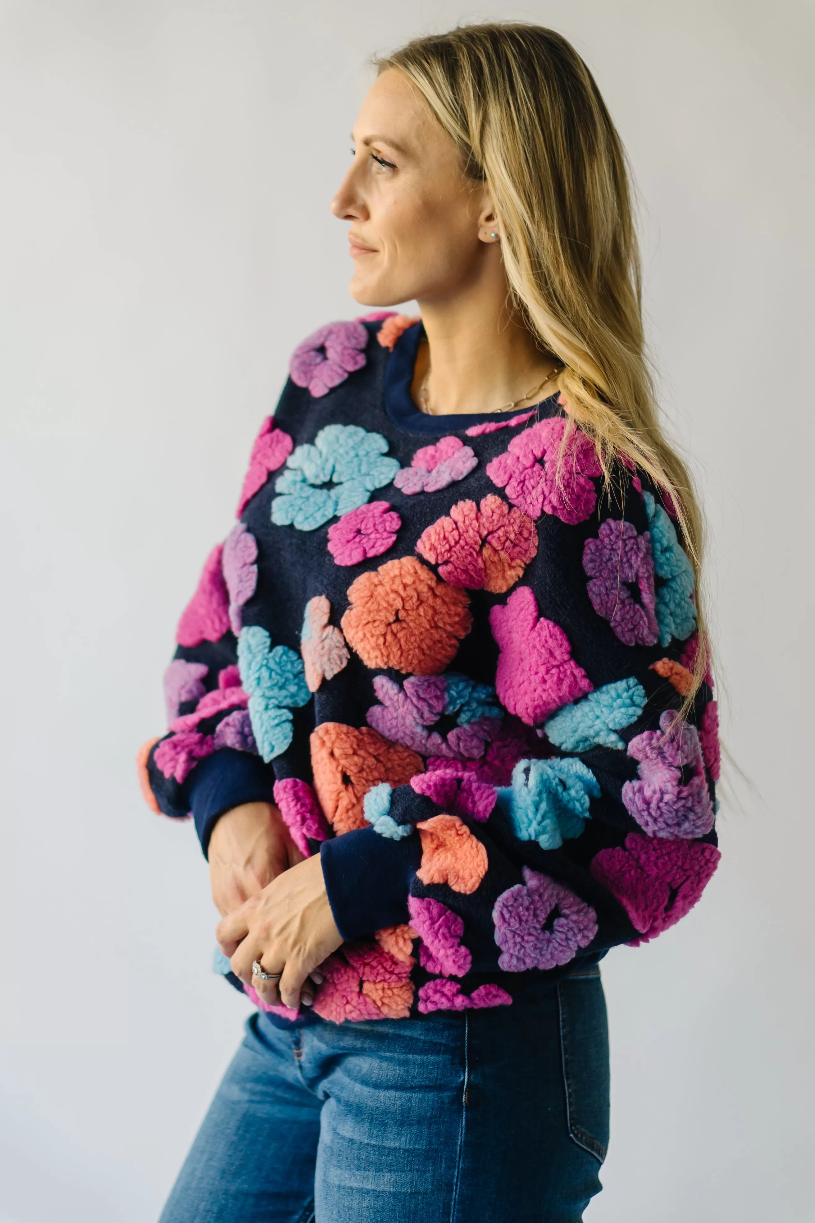 The Flanagan Sherpa Flower Detail Sweater in Navy   Fuchsia